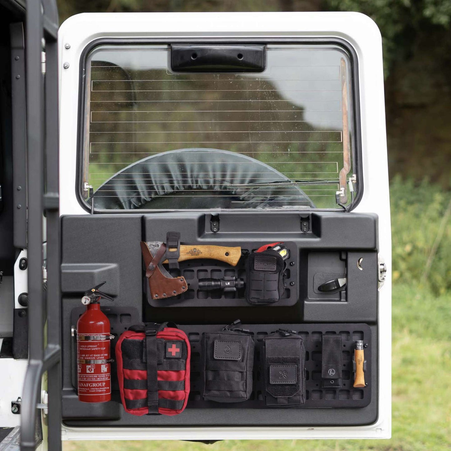 Back of a vehicle with storage compartments and equipment